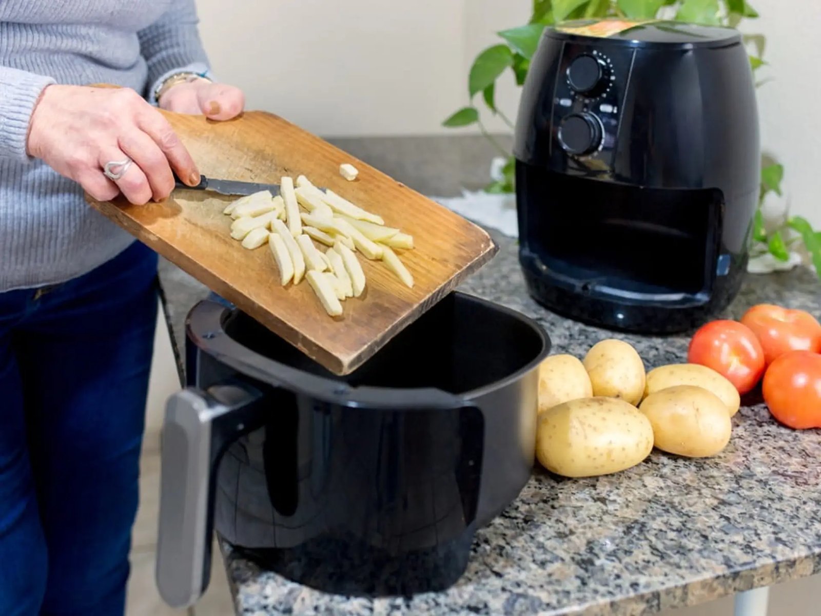 A close-up of a digital air fryer display showing high temperature settings.