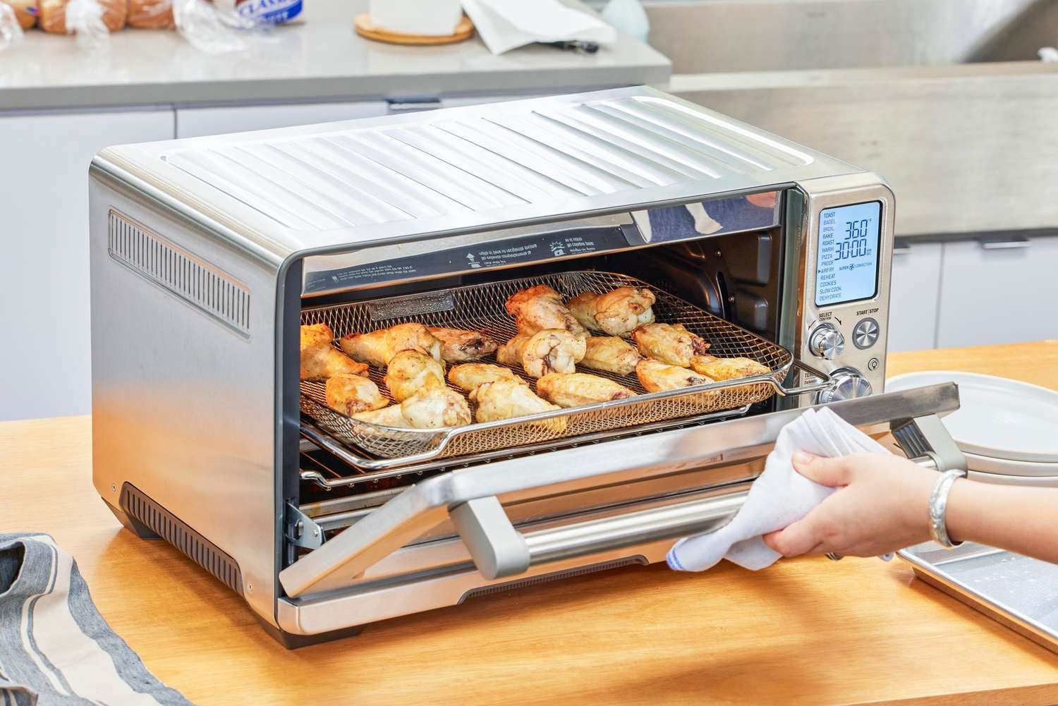 Overcrowded air fryer basket causing food to steam instead of crisping.