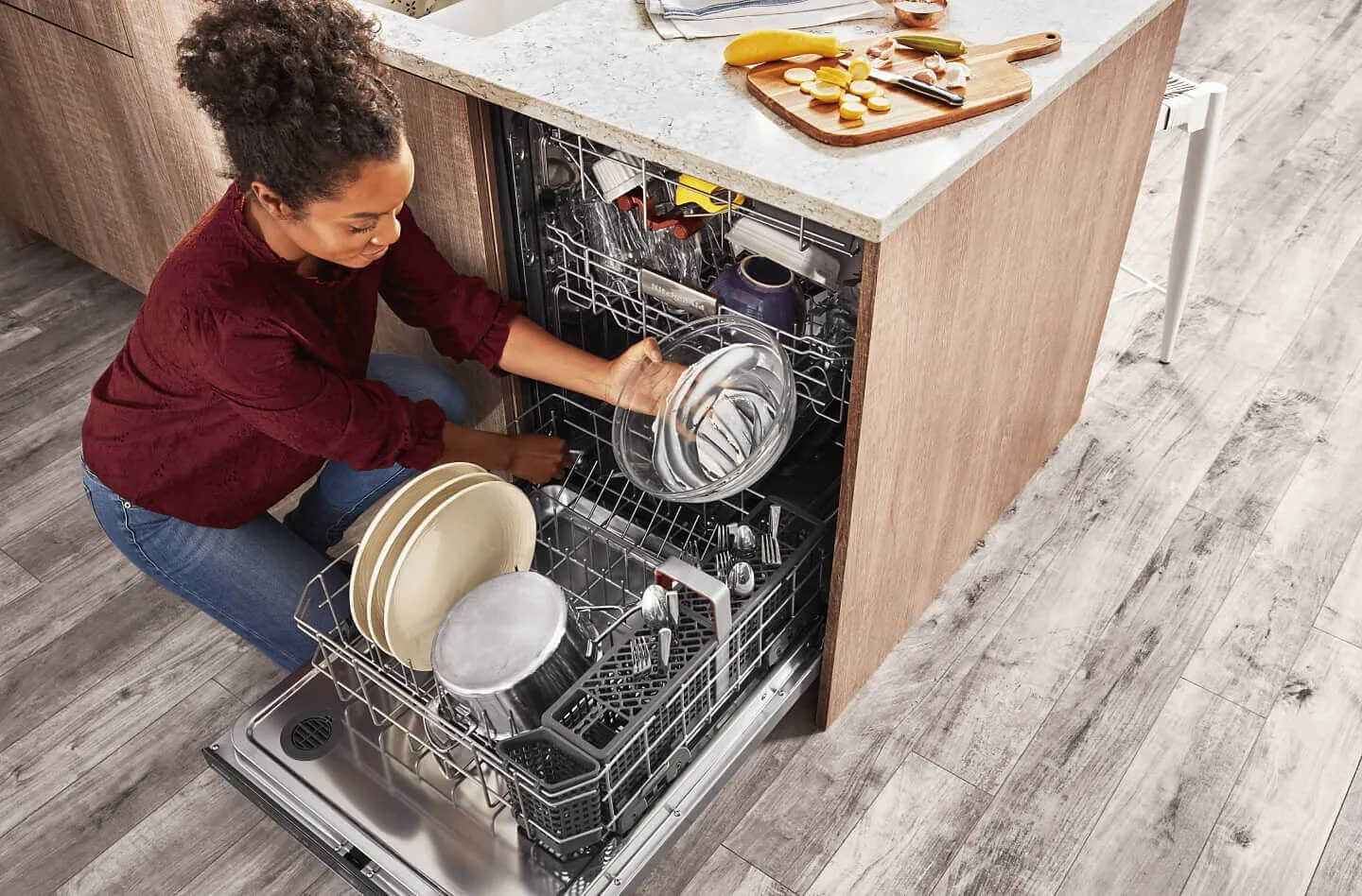 Carefully loading a dishwasher with plates ensures efficient cleaning results for every cycle.