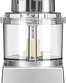 A food processor motor base sits near a sink, illustrating a common cleaning mistake.