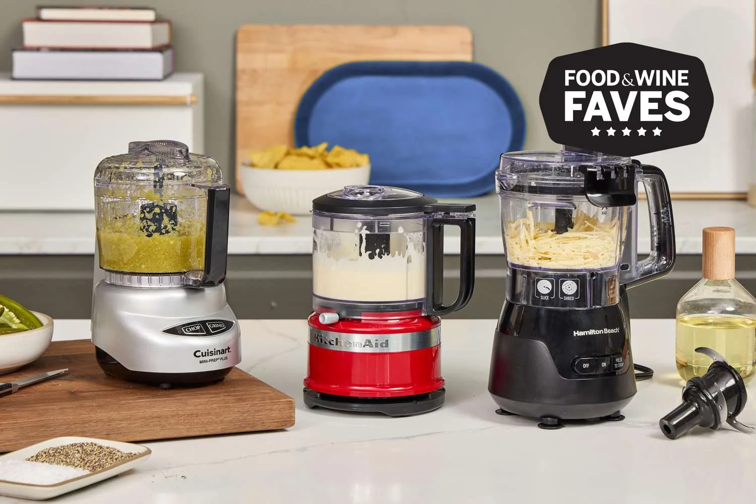 An overfilled food processor bowl shows unevenly chopped and crushed vegetable pieces.