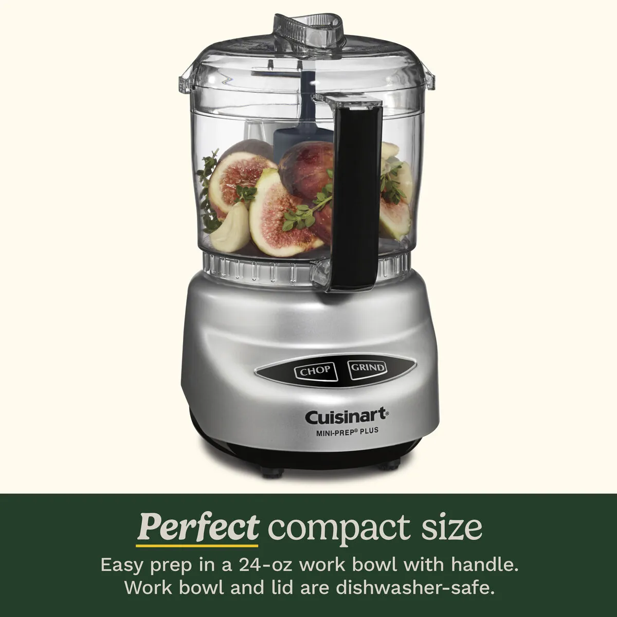A person carefully hand washes a sharp metal food processor blade in the sink.